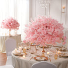 Pastel pink bloom ball quartet for wedding reception area