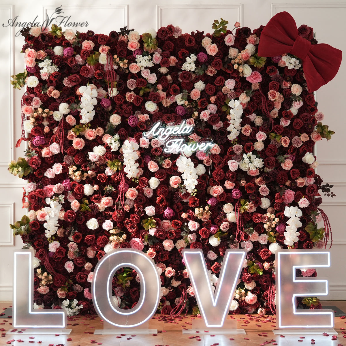 Burgundy and blush artificial flower wall backdrop for wedding photo booth