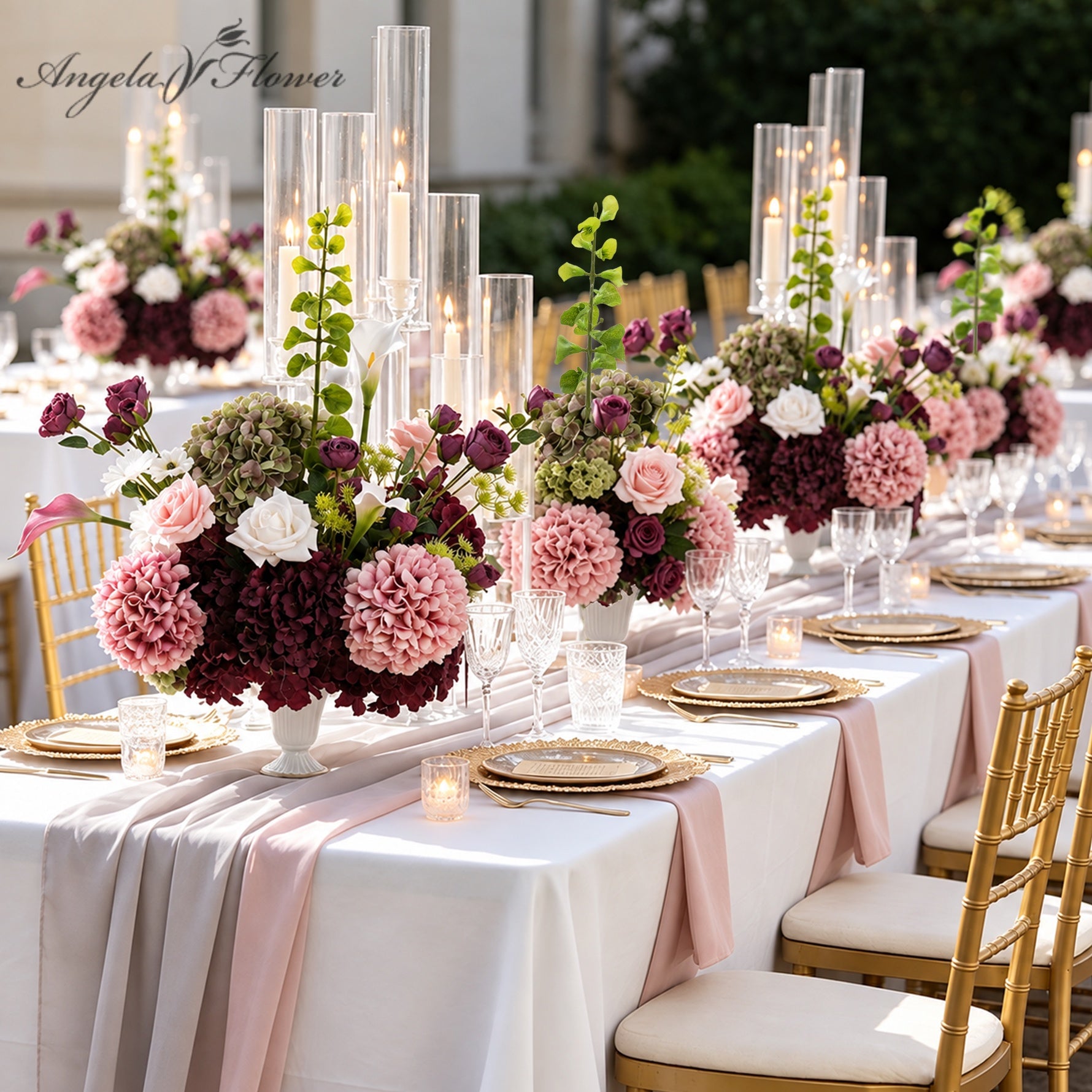 Artificial flower table centerpiece for outdoor fall wedding reception tablescape