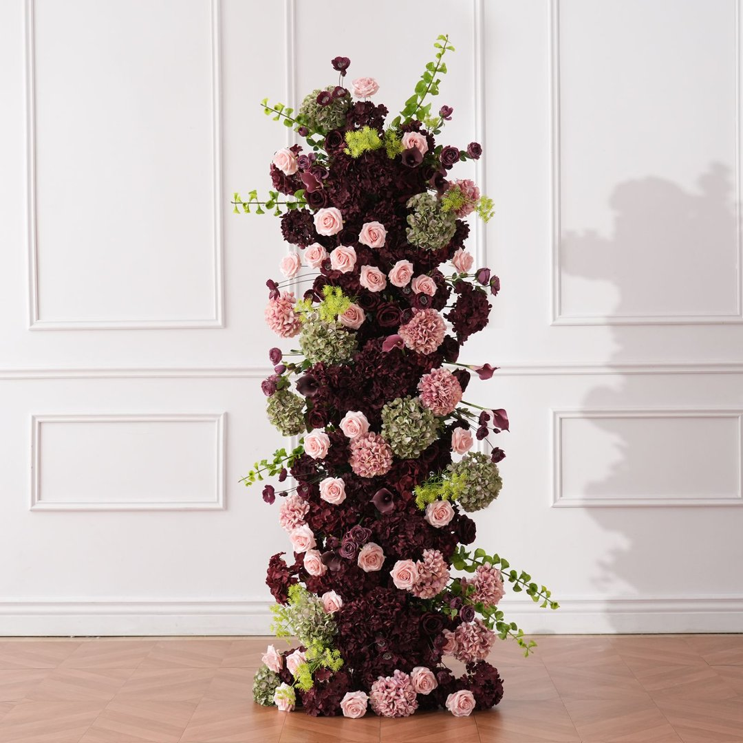 Mixed roses, hydrangea and greenery on tall flower pillar