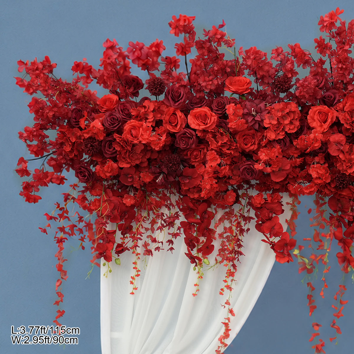 red wisteria cascading arch with sheer drape