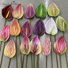 multicolor‑artificial‑anthurium‑flower‑stems‑product‑flat‑lay
