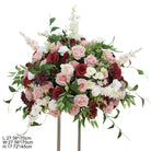 ceremony‑reception‑faux‑floral‑centerpiece‑red‑drape‑background‑shot