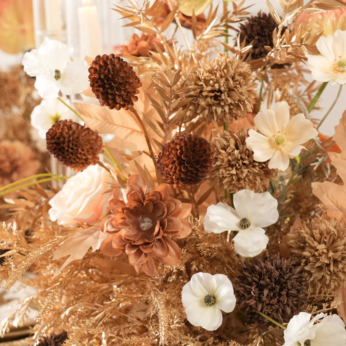 Metallic golden leaves mixed faux flower table arrangement for events