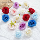 Artificial rose flower heads in multiple colors for DIY floral arrangements