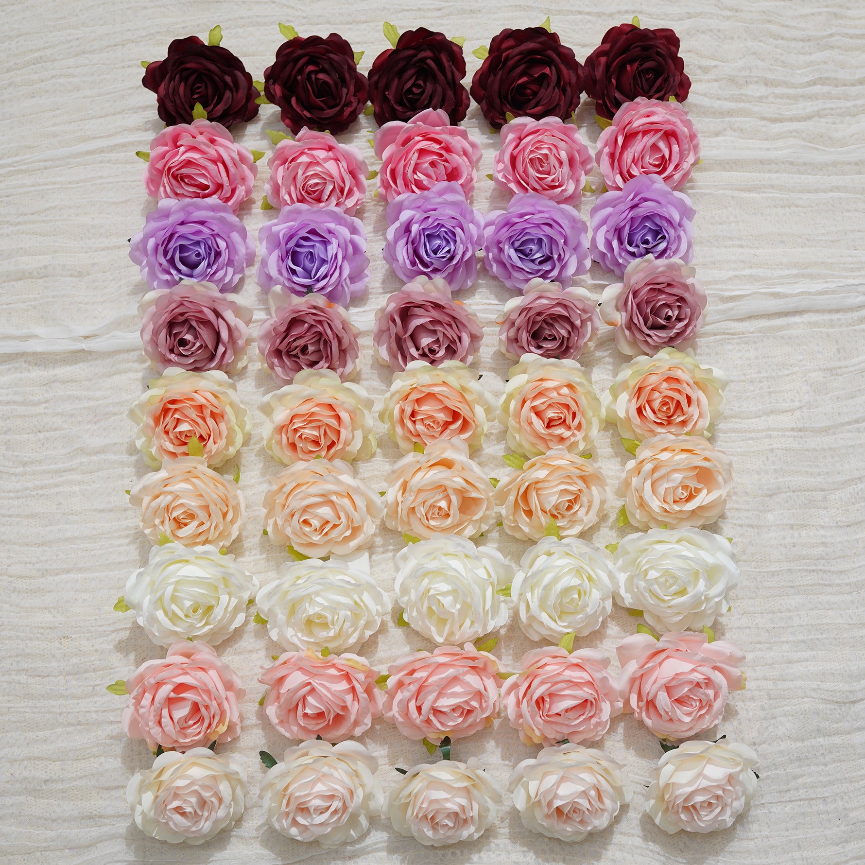 pure‑white‑artificial‑rose‑bloom‑palm‑hand‑comparison‑view