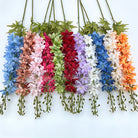 dusty‑orange‑artificial‑delphinium‑sprays‑wedding‑arrangement‑material