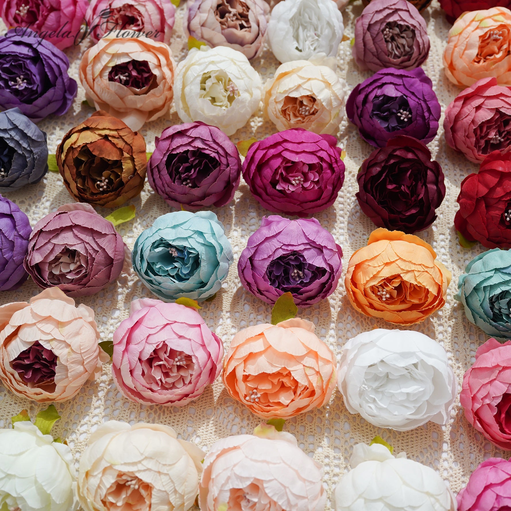 wine-maroon-silk-ranunculus-decor