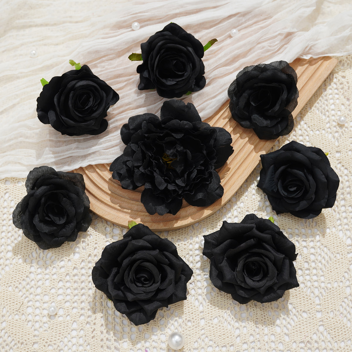 Mixed size black rose heads product display photo