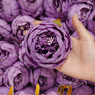 Lavender silk ranunculus wedding blooms