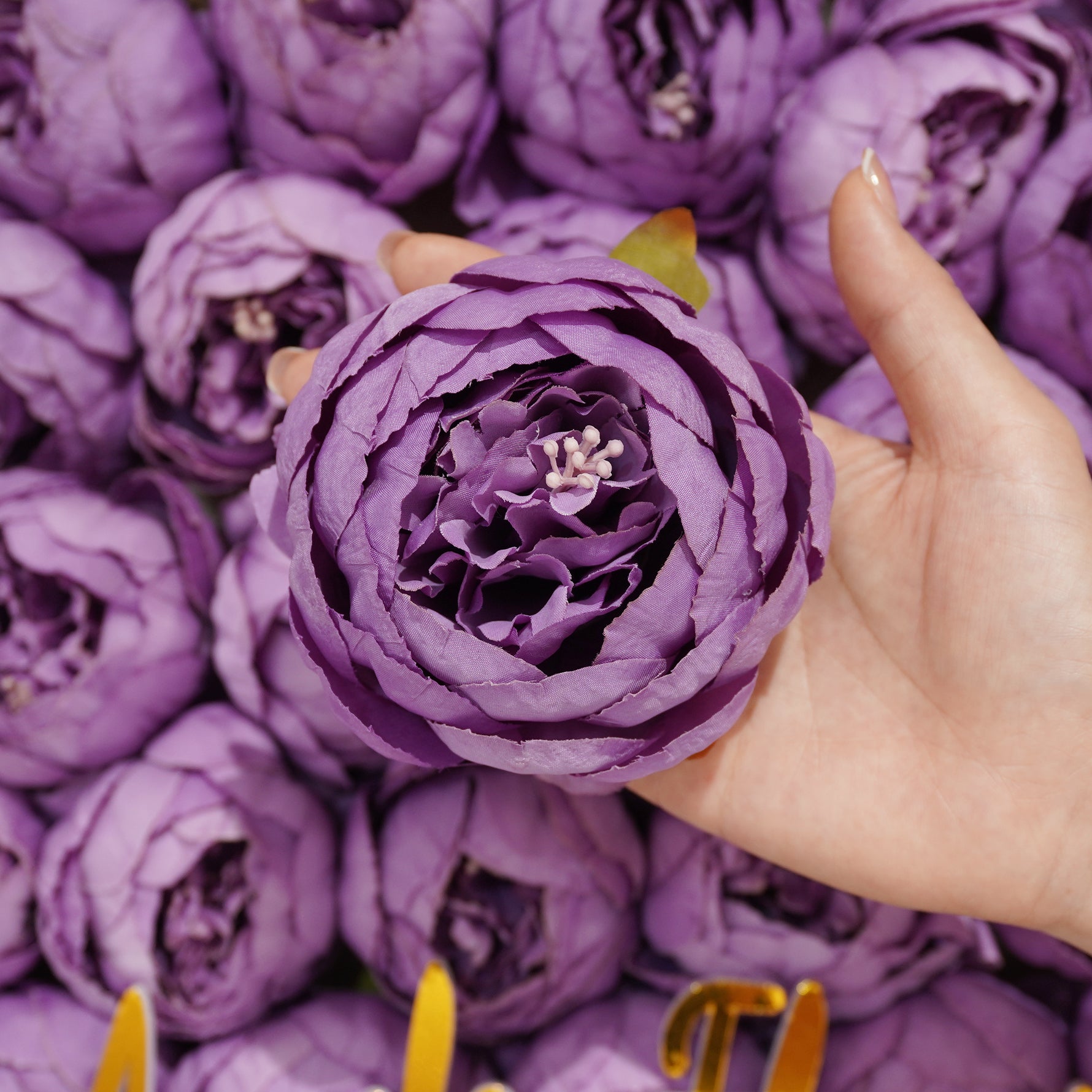 Lavender silk ranunculus wedding blooms