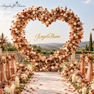 Landscape outdoor wedding scene with heart flower arch