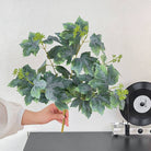 Indoor table decor fake grape foliage