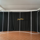 Reception photo backdrop using curved metal frame and crystal hangings