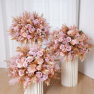 Pink flower bouquet with metallic gold foliage sprigs