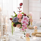 Garden‑style protea hydrangea table flower arrangement