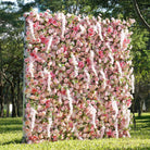 Large pink floral backdrop with rose and wisteria blooms for wedding stage decoration