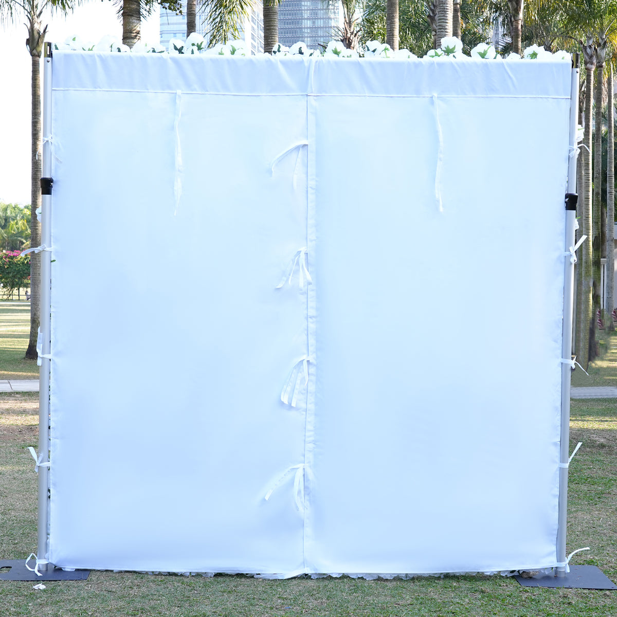 Portable white flower wall for wedding photo‑booth background