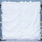 Faux white flower wall made of baby's breath for wedding reception stage background decor