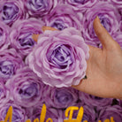 hand‑held‑artificial‑burgundy‑rose‑bloom‑size‑demo‑photo