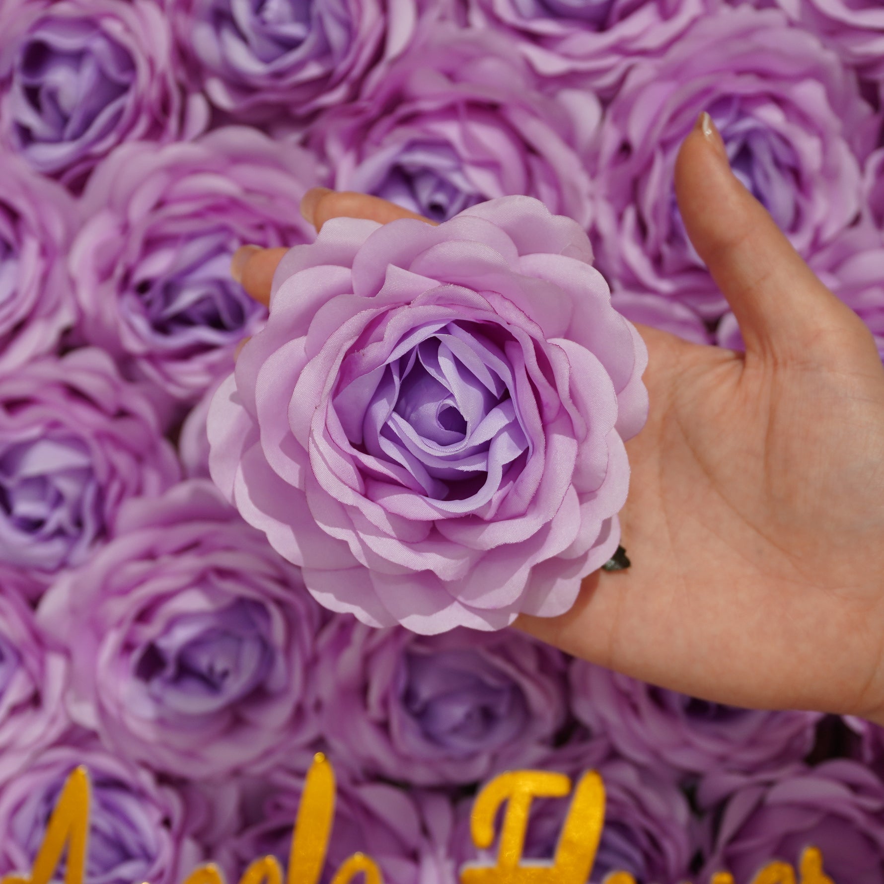 hand‑held‑artificial‑burgundy‑rose‑bloom‑size‑demo‑photo