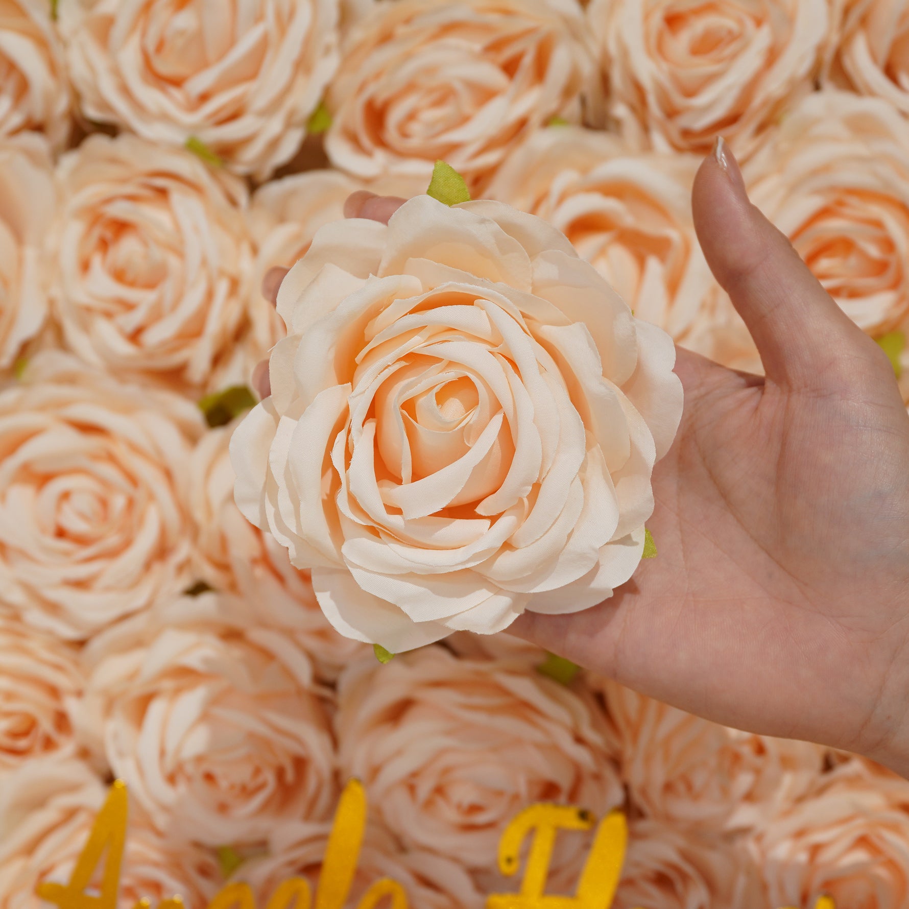 hand‑held‑fake‑large‑lavender‑rose‑flower‑detail‑shot