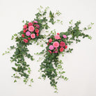 indoor‑wedding‑pink‑floral‑curtain‑flower‑display
