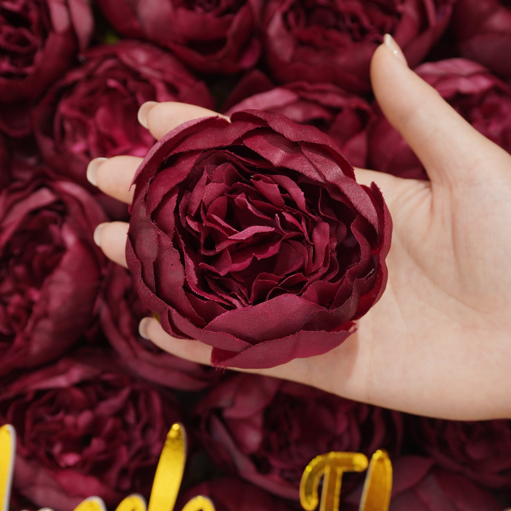 Dusty mauve artificial ranunculus blooms
