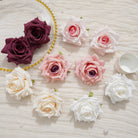 pure‑white‑artificial‑rose‑flower‑head‑wood‑texture‑backdrop