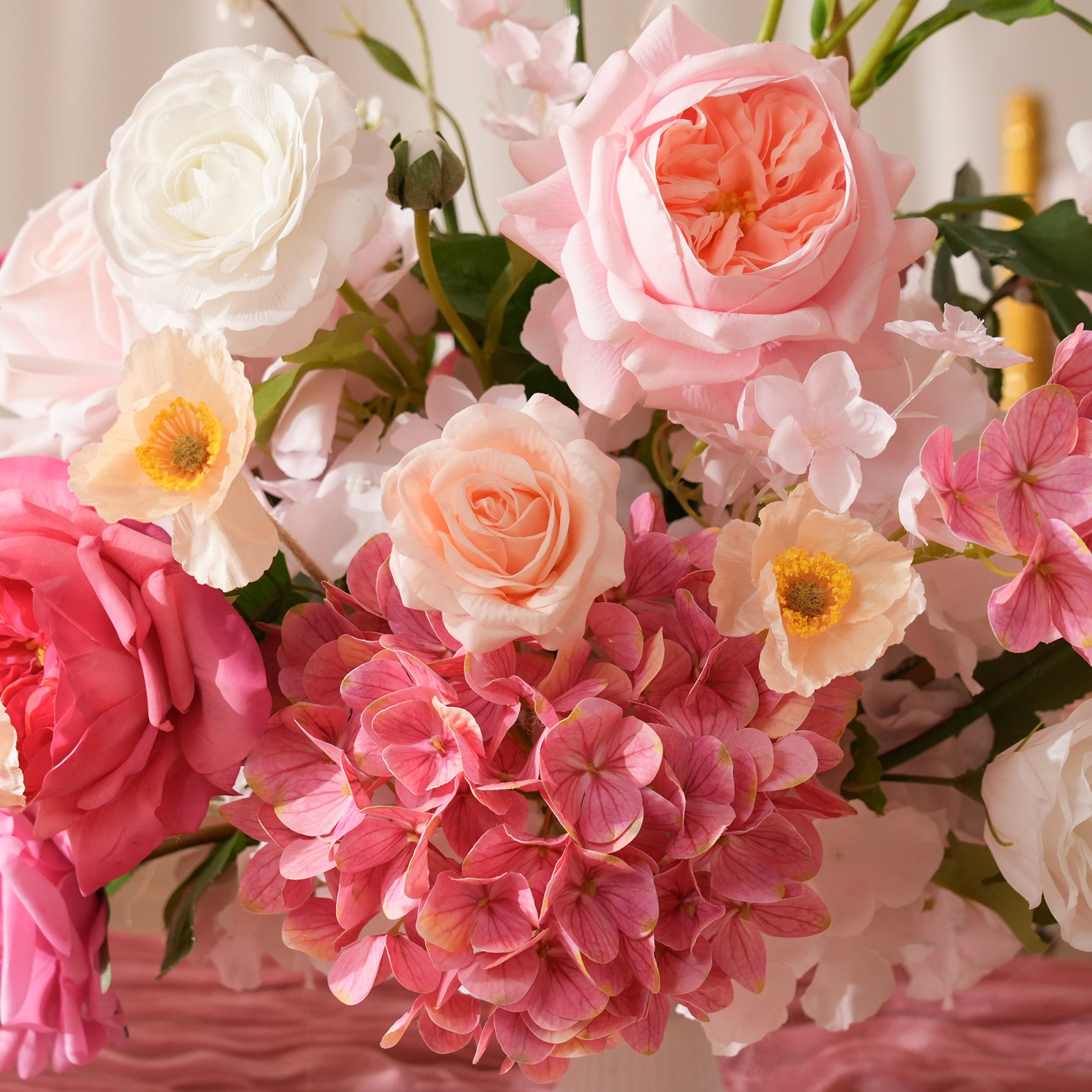 white rose wedding centerpiece with greenery leaves