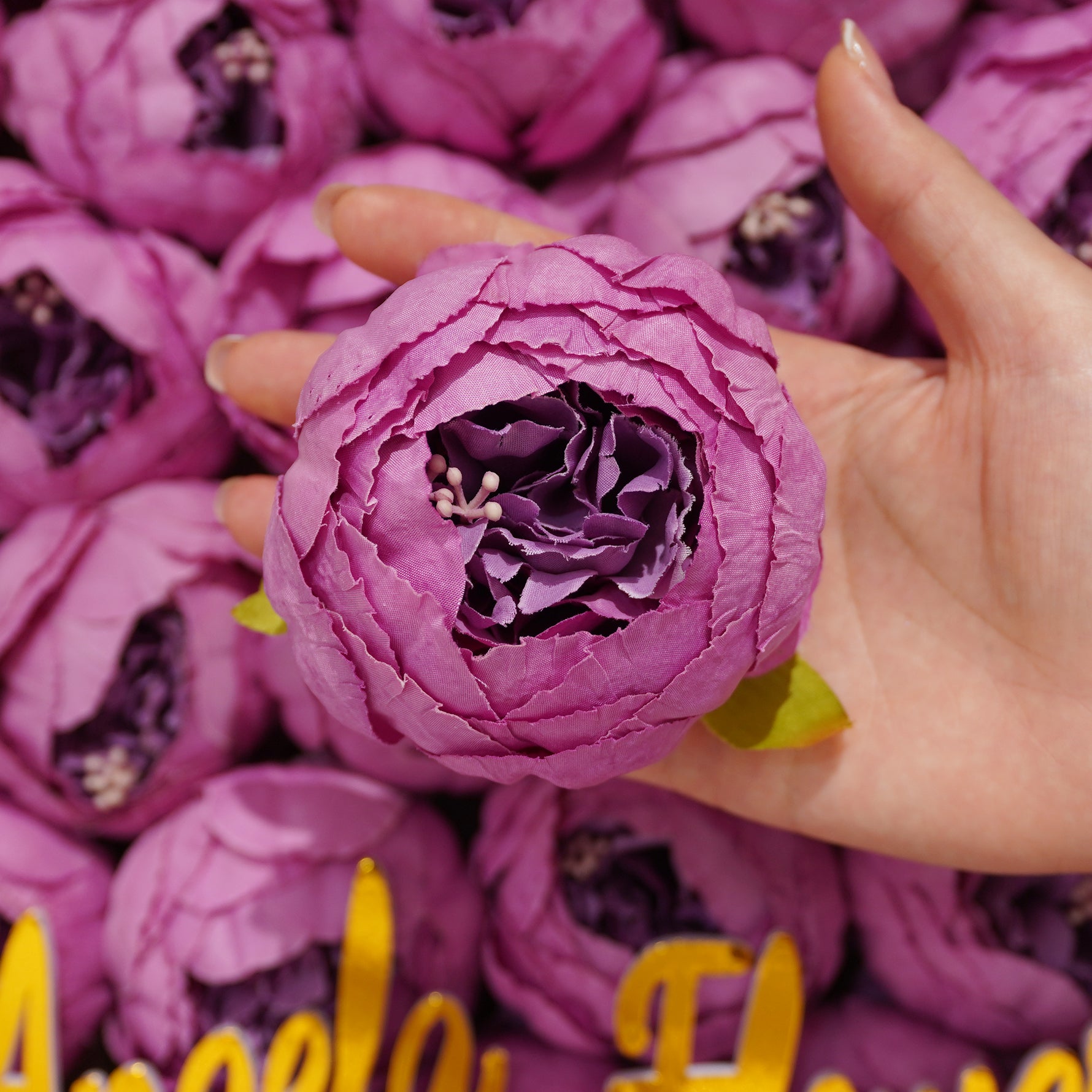 Rose magenta artificial ranunculus heads

