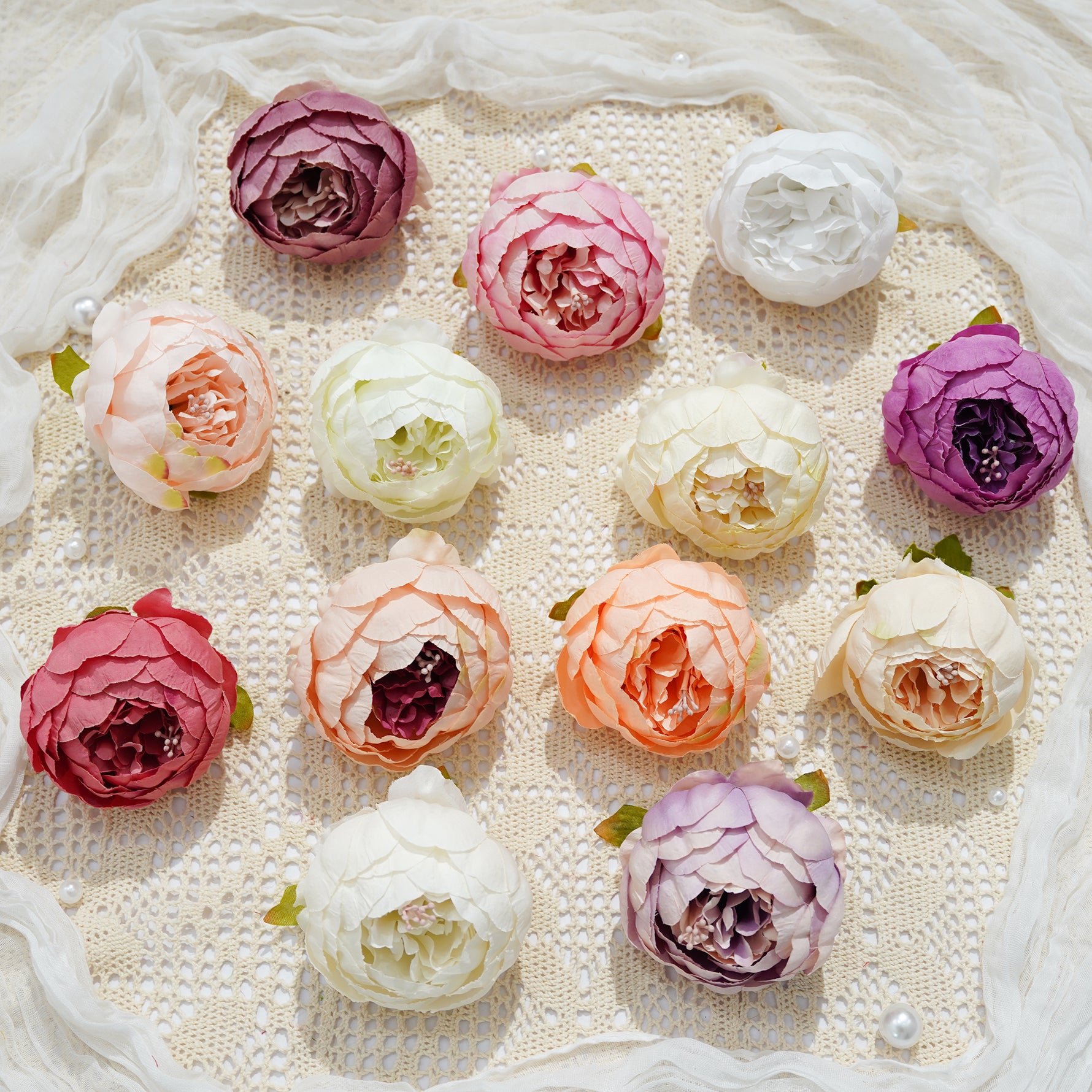 Fuchsia pink silk ranunculus wedding decor blooms

