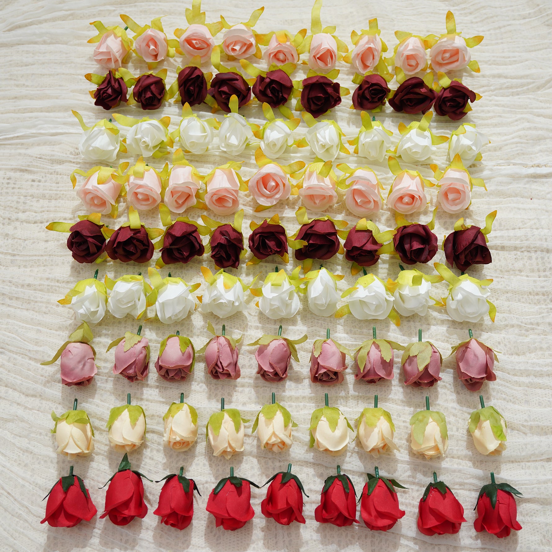 multi‑tone‑faux‑rose‑buds‑flat‑lay‑studio‑product