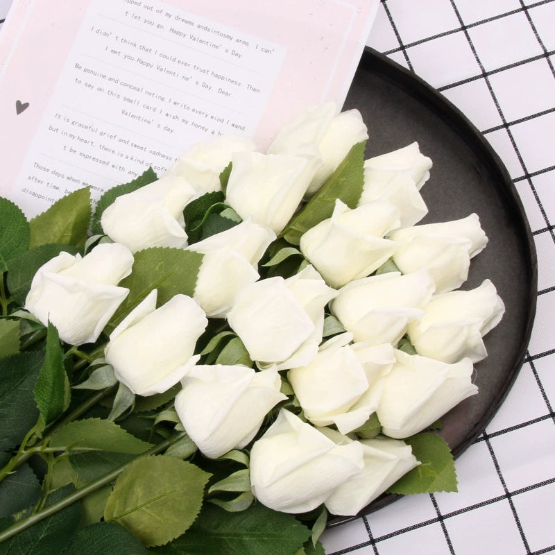 vibrant-white-artificial-rose-buds-closeup
