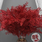 Feathery faux cedar greenery sprig for wedding floral arrangements