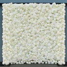 Event using reusable faux white flower wall
