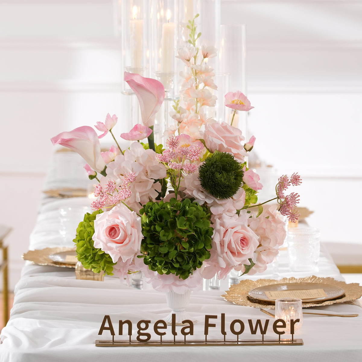 Soft romantic garden-style faux floral centerpiece for wedding tables