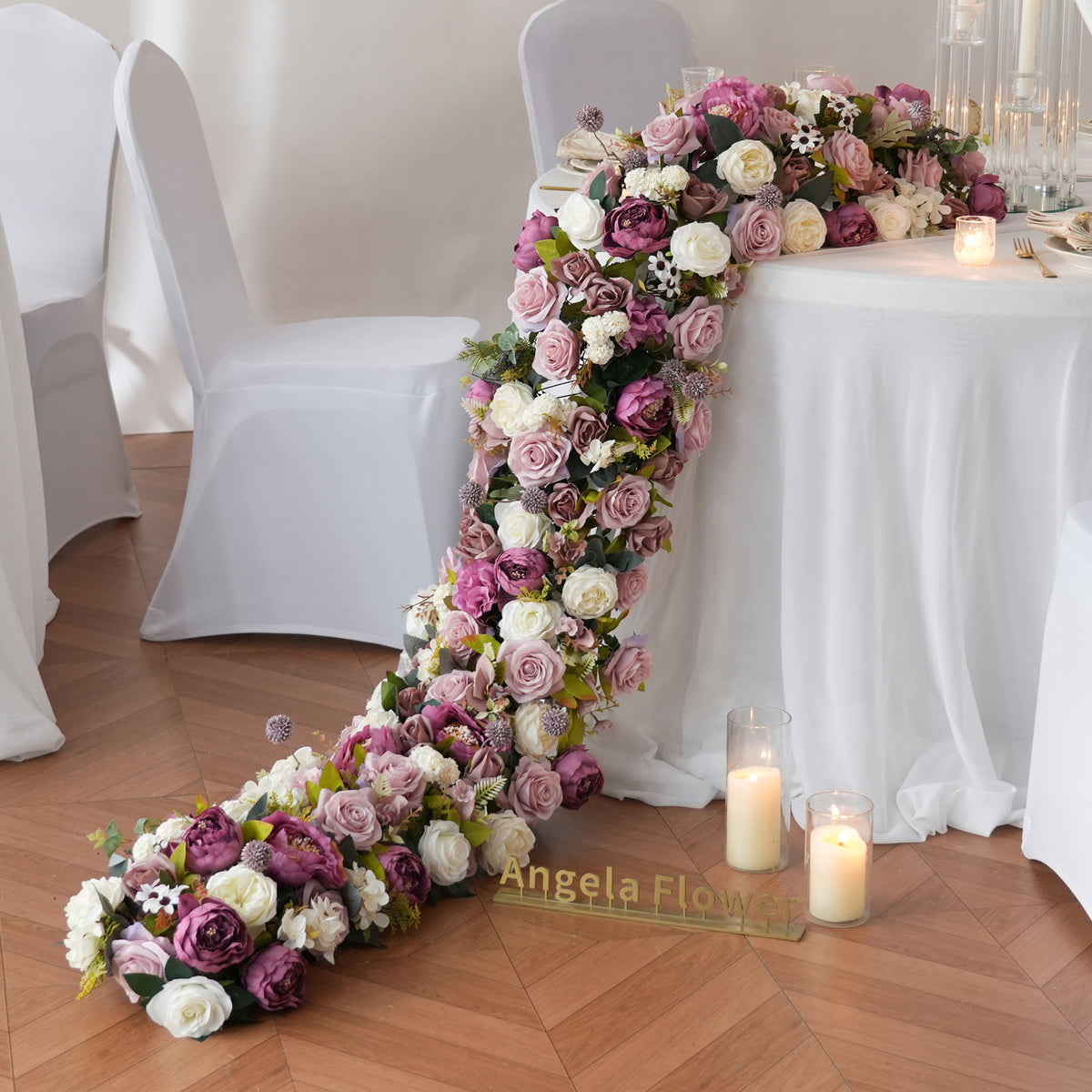 Lush flower for wedding head table, vintage mauve purple and blush pink tones with fresh green foliage