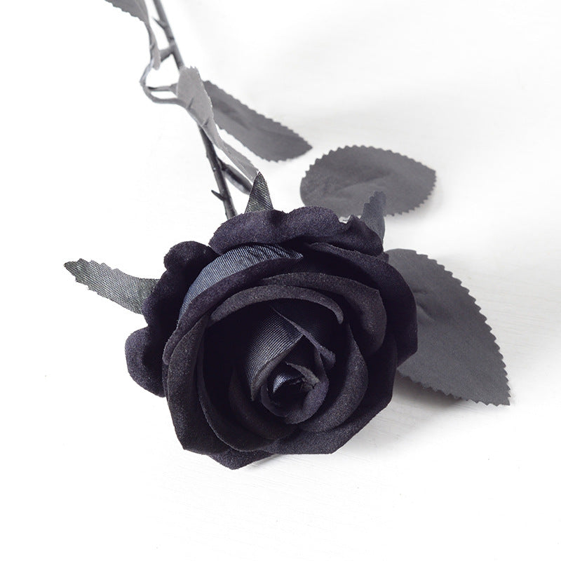 Plum purple fake long stem rose bloom