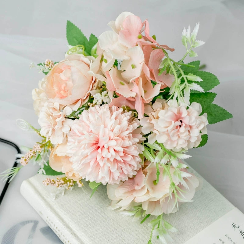 pastel tone faux rose peony dahlia mixed floral arrangement