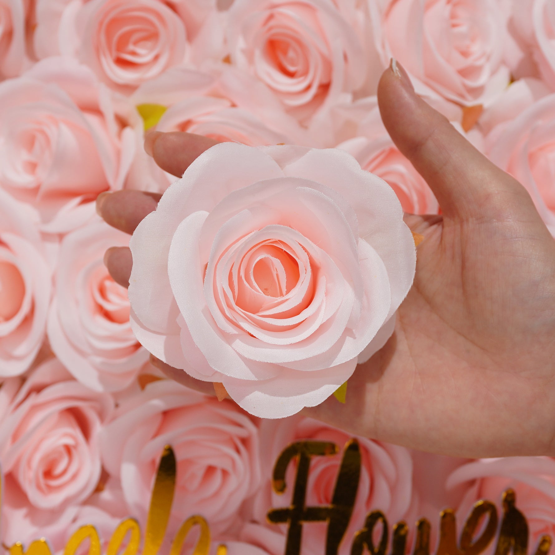 artificial rose flower head