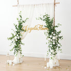 elegant‑white‑rose‑swag‑indoor‑ceremony‑backdrop