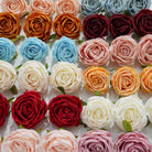 pastel-rose-flower-heads-table-centerpiece