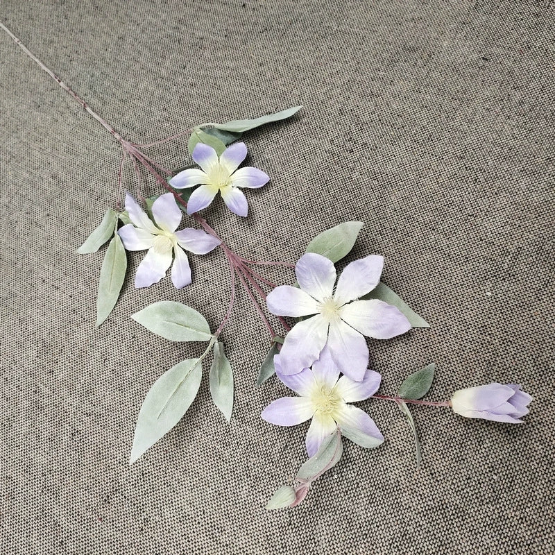 fake-clematis-branches-for-centerpiece-making

