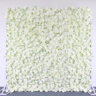 Group display of multiple separate white flower wall panels
