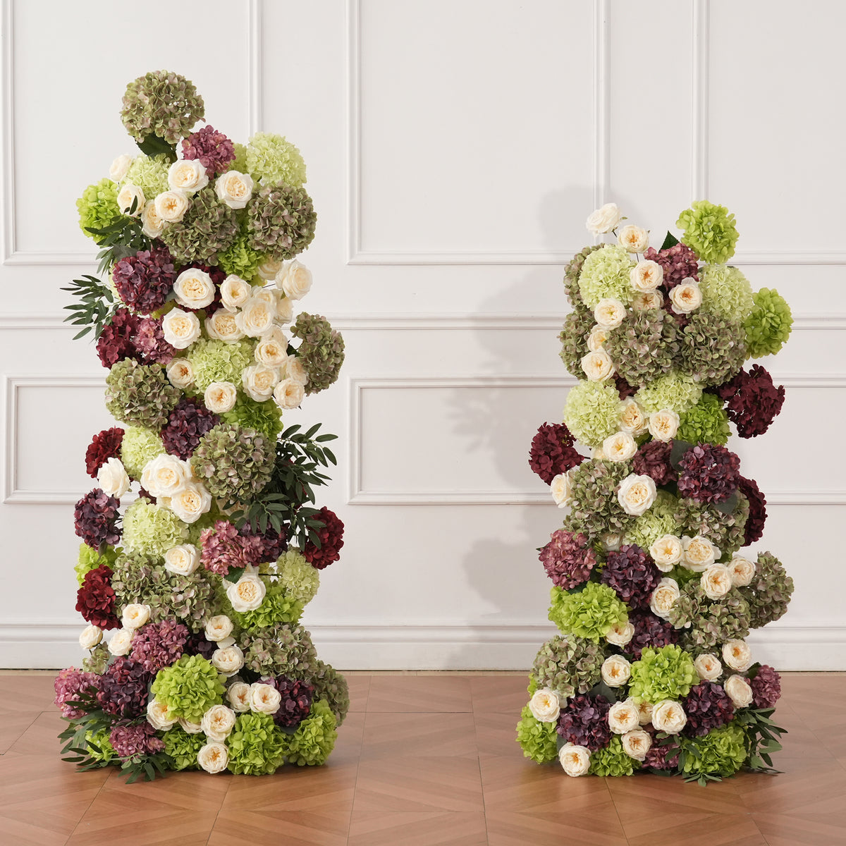 Hydrangea pillar matched with tall candle holders for tables