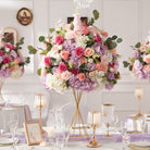 Pastel lilac and peach faux flower centerpiece fit for gold pedestal vase