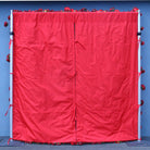 Portable fabric‑backed artificial rose floral wall for event and business photo setup