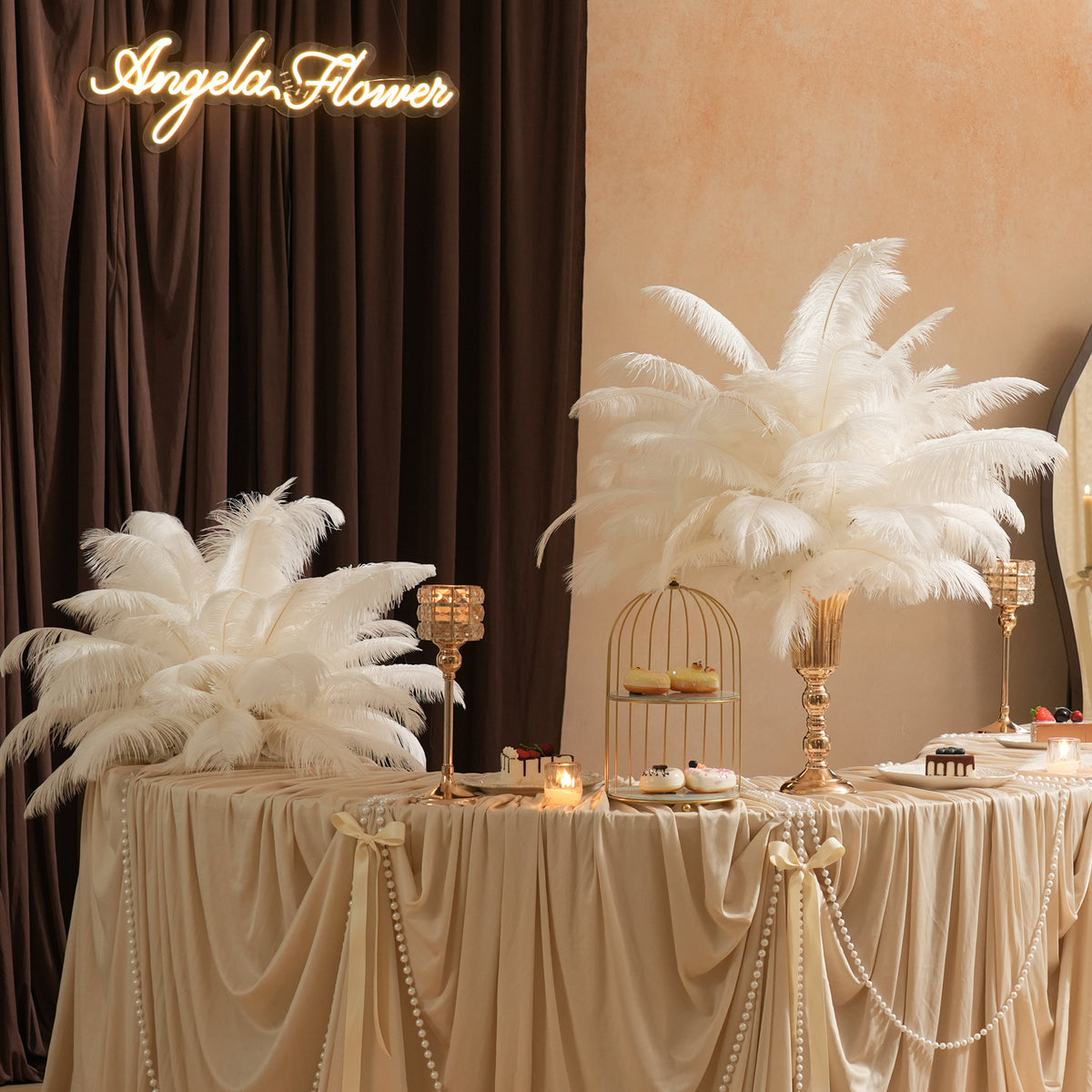 Minimalist white feather centerpiece for wedding reception