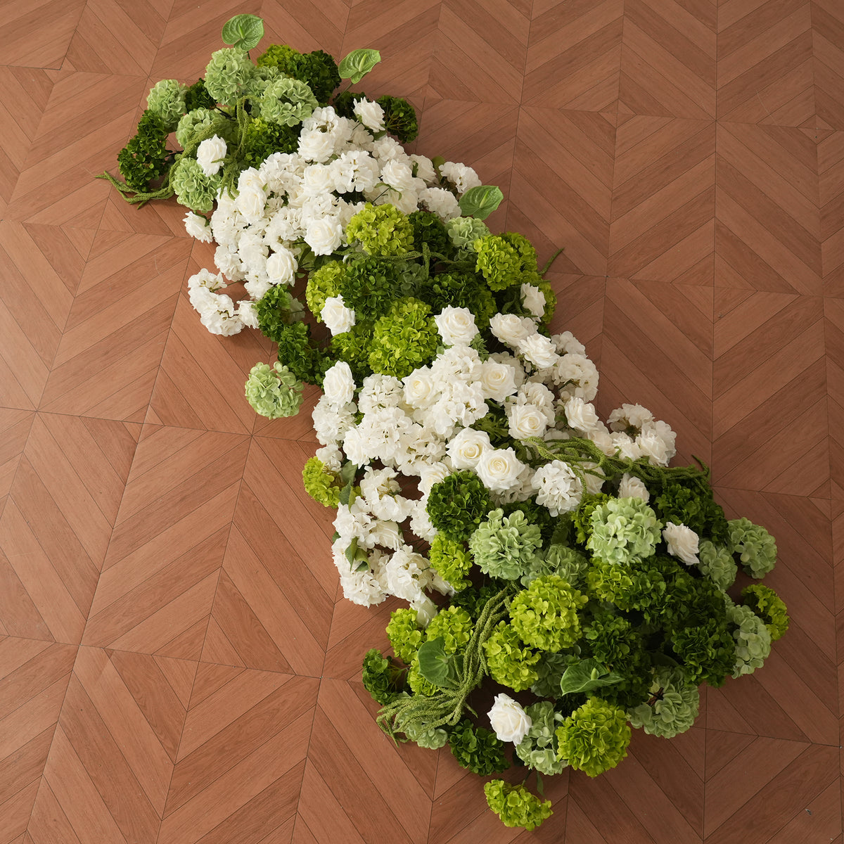 white hydrangea wedding arch for reception backdrop